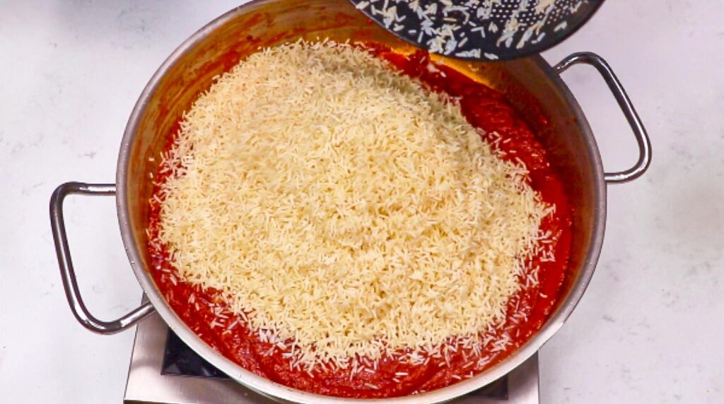a pan of food with rice