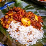 Rice and beans with local pepper sauce